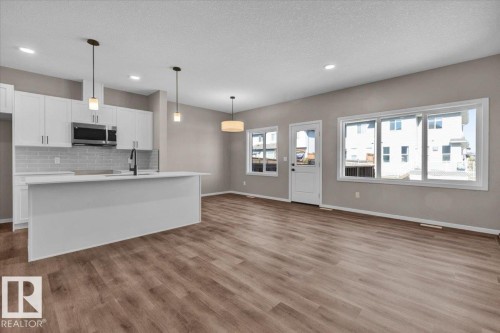 1152 South Creek Wynd, Stony Plain, AB - Indoor Photo Showing Kitchen With Double Sink
