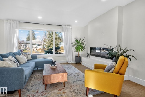 11155 37 Avenue, Edmonton, AB - Indoor Photo Showing Living Room With Fireplace