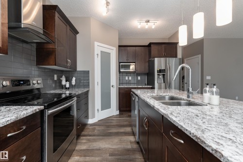 2211 Calhoun Link Link, Edmonton, AB - Indoor Photo Showing Kitchen With Double Sink With Upgraded Kitchen