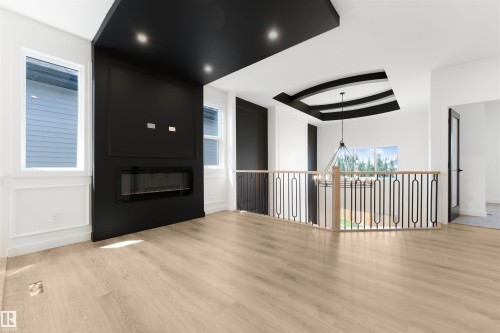 48 Grassview Crescent, Spruce Grove, AB - Indoor Photo Showing Other Room With Fireplace