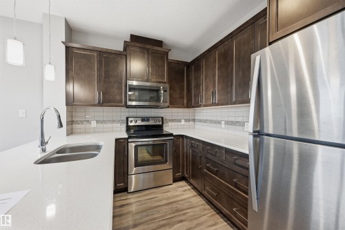 414 812 Welsh Drive, Edmonton, AB - Indoor Photo Showing Kitchen With Stainless Steel Kitchen With Double Sink With Upgraded Kitchen