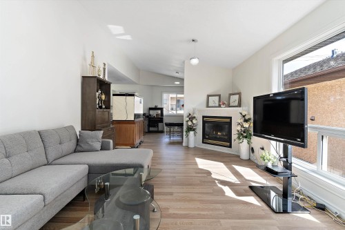 12711 128 Street, Edmonton, AB - Indoor Photo Showing Living Room With Fireplace