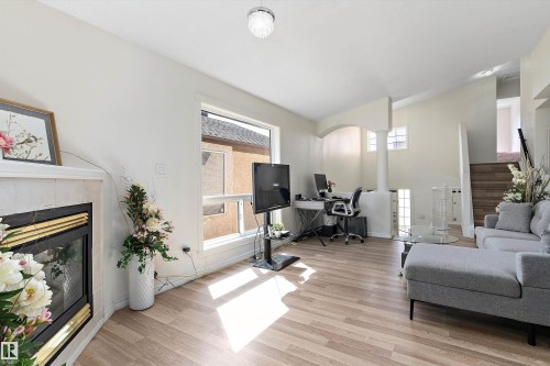 12711 128 Street, Edmonton, AB - Indoor Photo Showing Living Room With Fireplace