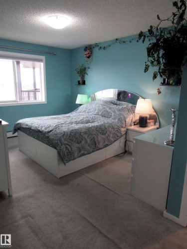 453 1196 Hyndman Road Nw, Edmonton, AB - Indoor Photo Showing Bedroom