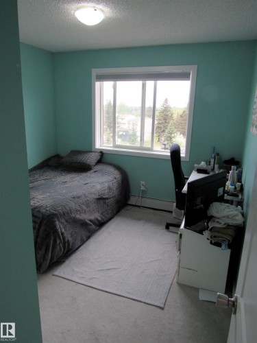 453 1196 Hyndman Road Nw, Edmonton, AB - Indoor Photo Showing Bedroom