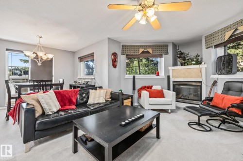107 6708 90 Avenue, Edmonton, AB - Indoor Photo Showing Living Room With Fireplace