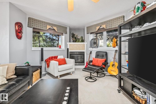 107 6708 90 Avenue, Edmonton, AB - Indoor With Fireplace