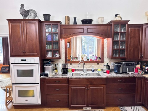 673001A Rge Road 215, Rural Athabasca County, AB - Indoor Photo Showing Kitchen With Double Sink