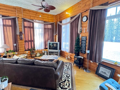 673001A Rge Road 215, Rural Athabasca County, AB - Indoor Photo Showing Living Room With Fireplace