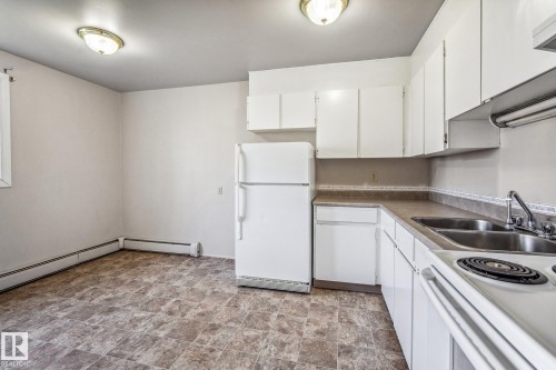 22 11265 31 Avenue, Edmonton, AB - Indoor Photo Showing Kitchen With Double Sink