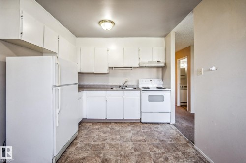 22 11265 31 Avenue, Edmonton, AB - Indoor Photo Showing Kitchen With Double Sink