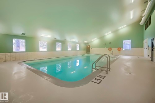 22 11265 31 Avenue, Edmonton, AB - Indoor Photo Showing Other Room With In Ground Pool