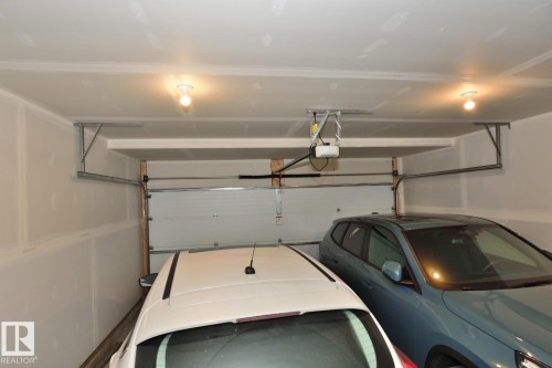 33 1910 Collip View, Edmonton, AB - Indoor Photo Showing Garage