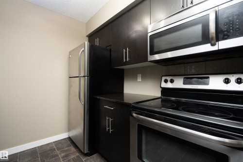 304 5390 Chappelle Road, Edmonton, AB - Indoor Photo Showing Kitchen