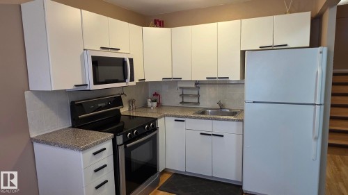 Edmonton, AB - Indoor Photo Showing Kitchen