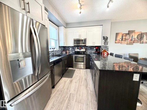 118 16903 68 Street, Edmonton, AB - Indoor Photo Showing Kitchen With Stainless Steel Kitchen With Upgraded Kitchen