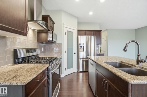 108 South Creek Wynd, Stony Plain, AB - Indoor Photo Showing Kitchen With Double Sink With Upgraded Kitchen