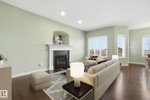108 South Creek Wynd, Stony Plain, AB - Indoor Photo Showing Living Room With Fireplace