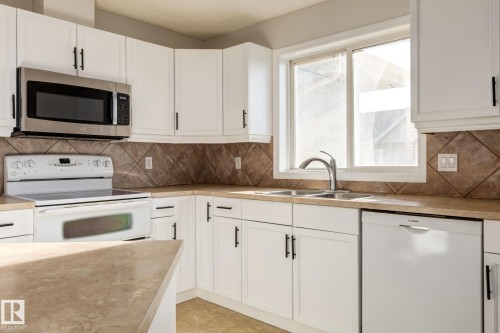 443 279 Suder Greens Drive, Edmonton, AB - Indoor Photo Showing Kitchen With Double Sink