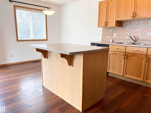 19 10909 106 Street, Edmonton, AB - Indoor Photo Showing Kitchen With Double Sink