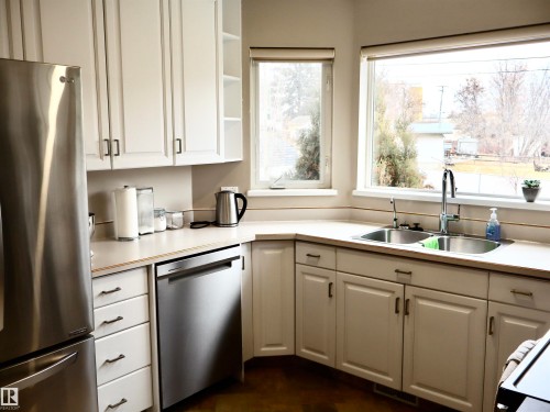 4823 49A Street, Barrhead, AB - Indoor Photo Showing Kitchen With Double Sink