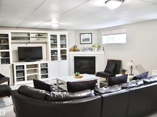 4823 49A Street, Barrhead, AB - Indoor Photo Showing Other Room With Fireplace