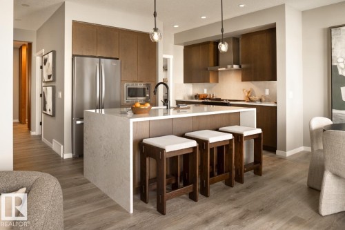 7103 51 Avenue, Beaumont, AB - Indoor Photo Showing Kitchen With Stainless Steel Kitchen With Upgraded Kitchen