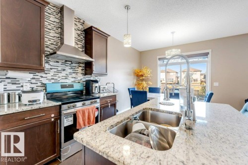 5424 20 Avenue, Edmonton, AB - Indoor Photo Showing Kitchen With Double Sink With Upgraded Kitchen