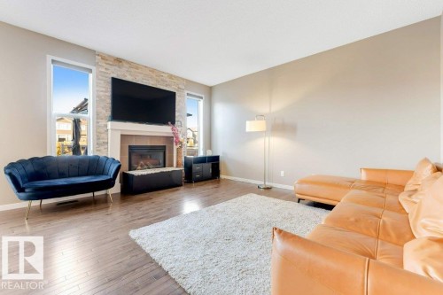 5424 20 Avenue, Edmonton, AB - Indoor Photo Showing Living Room With Fireplace