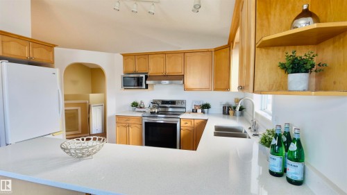 13023 35 Street, Edmonton, AB - Indoor Photo Showing Kitchen With Double Sink