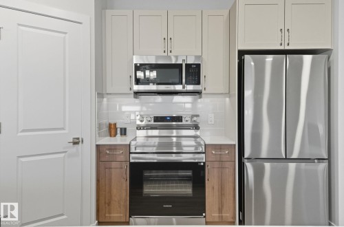 42 11 Dalton Link, Spruce Grove, AB - Indoor Photo Showing Kitchen With Stainless Steel Kitchen