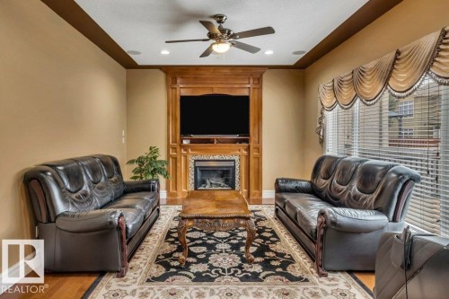 816 Wildwood Crescent, Edmonton, AB - Indoor Photo Showing Living Room With Fireplace