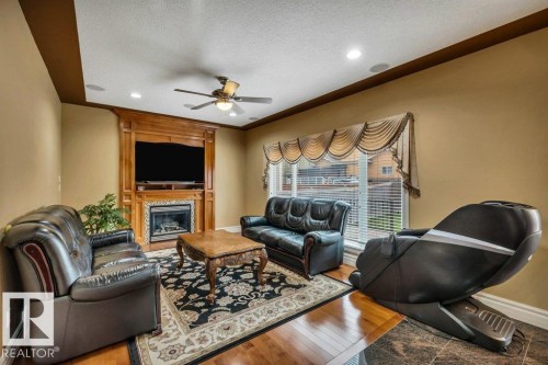 816 Wildwood Crescent, Edmonton, AB - Indoor Photo Showing Living Room With Fireplace