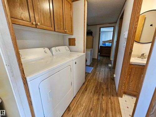 84 305 Calahoo Road, Spruce Grove, AB - Indoor Photo Showing Laundry Room