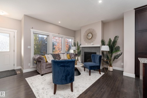 388 Allard Boulevard, Edmonton, AB - Indoor Photo Showing Living Room With Fireplace