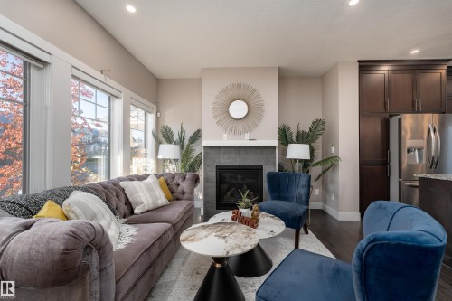 388 Allard Boulevard, Edmonton, AB - Indoor Photo Showing Living Room With Fireplace