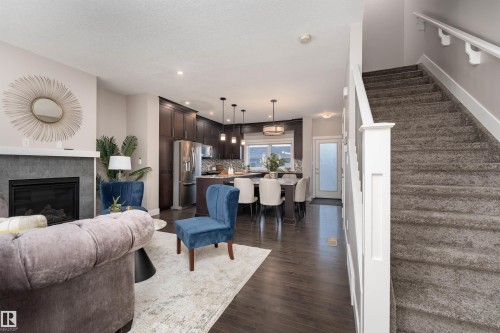 388 Allard Boulevard, Edmonton, AB - Indoor Photo Showing Living Room With Fireplace