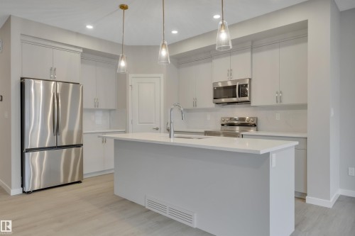 9100 Elves Loop, Edmonton, AB - Indoor Photo Showing Kitchen With Stainless Steel Kitchen With Upgraded Kitchen