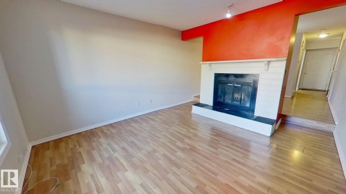 59 7604 29 Avenue, Edmonton, AB - Indoor Photo Showing Living Room With Fireplace