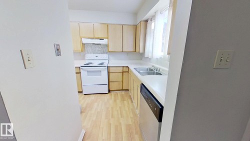 59 7604 29 Avenue, Edmonton, AB - Indoor Photo Showing Kitchen With Double Sink