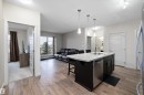 214 1004 Rosenthal Boulevard, Edmonton, AB  - Indoor Photo Showing Kitchen With Double Sink 