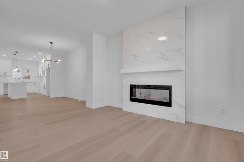 4109 67 Street, Beaumont, AB - Indoor Photo Showing Living Room With Fireplace