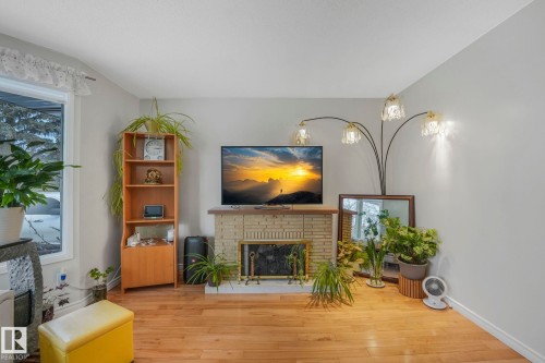 5107 56 Avenue, Leduc, AB - Indoor Photo Showing Living Room With Fireplace