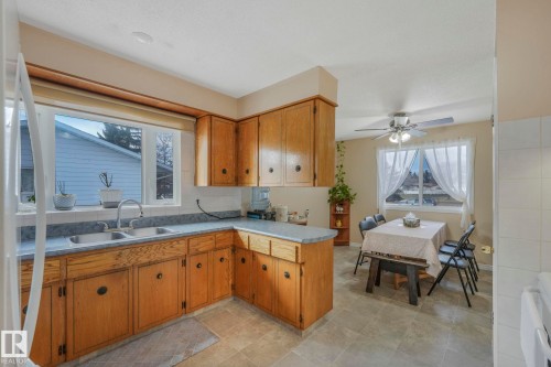 5107 56 Avenue, Leduc, AB - Indoor Photo Showing Kitchen With Double Sink