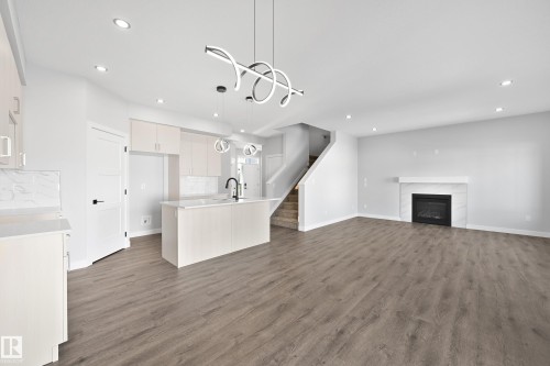 76 Maple Crescent, Gibbons, AB - Indoor With Fireplace