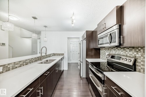 359 Simmonds Way, Leduc, AB - Indoor Photo Showing Kitchen With Double Sink With Upgraded Kitchen