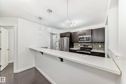 359 Simmonds Way, Leduc, AB - Indoor Photo Showing Kitchen With Upgraded Kitchen