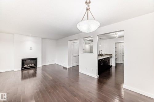 359 Simmonds Way, Leduc, AB - Indoor Photo Showing Living Room With Fireplace