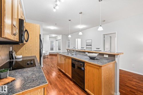 127 4831 104A Street, Edmonton, AB - Indoor Photo Showing Kitchen With Double Sink