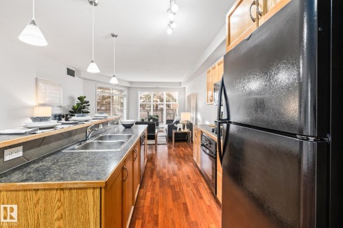 127 4831 104A Street, Edmonton, AB - Indoor Photo Showing Kitchen With Double Sink